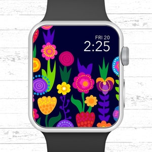 Op de afbeelding: Een smartwatch met een zwarte band en een wit gezicht. Het gezicht heeft een kleurrijk bloemenpatroon en geeft de tijd weer als 2:25 en de datum als FRI 20.