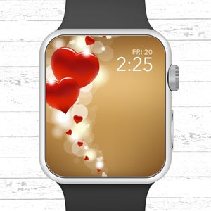 Könnte beinhalten: Eine Smartwatch mit goldenem Hintergrund und roten Herzen auf dem Bildschirm. Die Uhrzeit ist 2:25 und das Datum ist FRI 20.