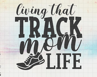 May include: Black and white graphic design with the text "living that TRACK MOM LIFE" and a running shoe silhouette. The design also includes the file types: SVG, EPS, DXF, and PNG. The background has a grid pattern with pastel colors.