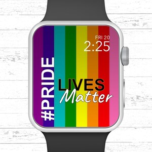 May include: A smartwatch with a rainbow pride flag background and the text "#PRIDE LIVES Matter" on the screen. The time is 2:25 and the date is FRI 20.