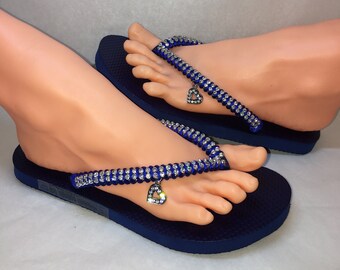 navy blue flip flops with bling