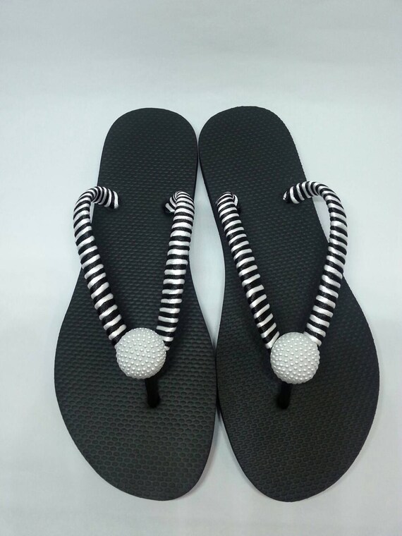 black and white striped flip flops