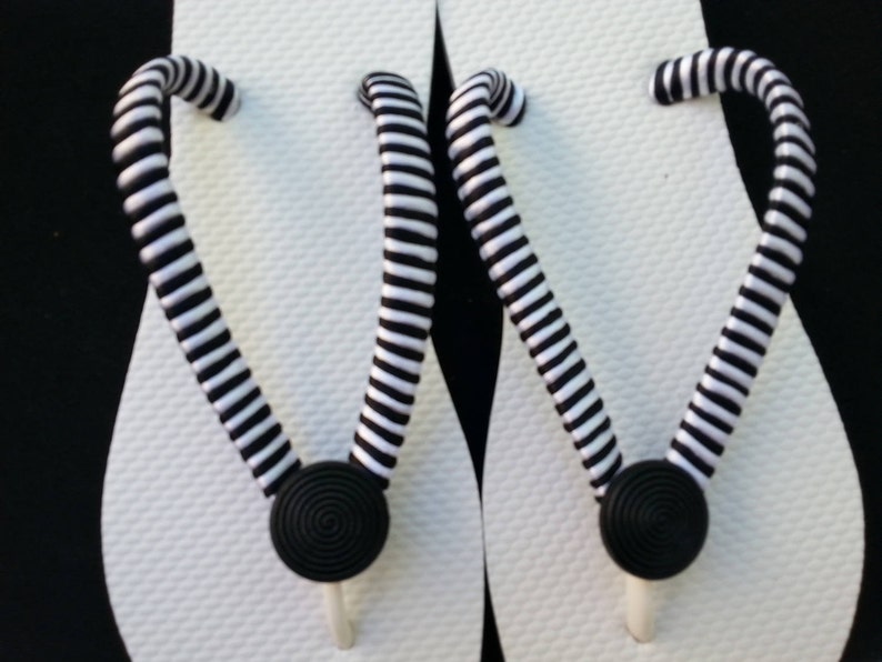 Beach flip flops Any occasion black and white women/'s flip flops Black and white striped flip flops with black button for women