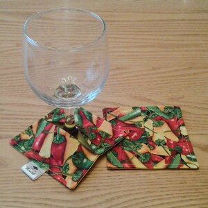 Wine coaster (2) with pepper patterns.