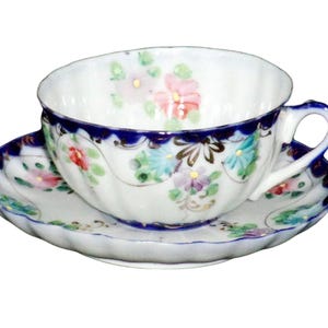 Fabulous Antique Cup and Saucer, flow blue, very high quality
