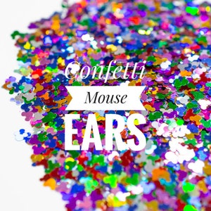 May include: A colourful mix of confetti in the shape of mouse ears. The confetti is a blend of red, blue, green, yellow, and purple. The image includes the text "Confetti Mouse EARS".