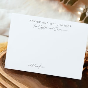 May include: A white card with the text "Advice and Well Wishes for Jayden and Sierra" and "with love from."