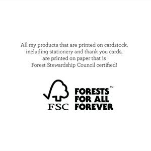 May include: Black and white logo for the Forest Stewardship Council (FSC) with the text "FORESTS FOR ALL FOREVER" and the FSC logo, a checkmark inside a tree.