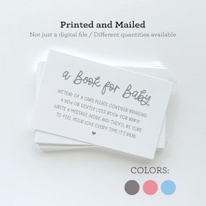May include: A white card with gray text that reads "a Book for Baby". The text below says "Instead of a card, please consider bringing a new or gently used book for baby! Write a message inside and they'll be sure to feel your love every time it's read". The card is stacked on top of other white cards. The text "COLORS:" is at the bottom of the image with three colored circles: gray, pink, and blue.