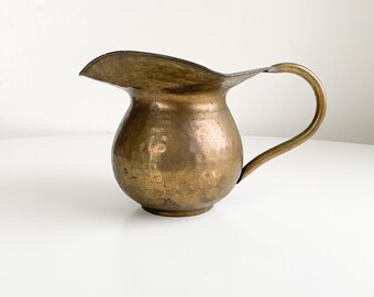 Vintage brass watering can