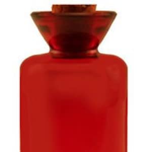May include: A red glass bottle with a cork stopper. The bottle has a wide mouth and a flared top.