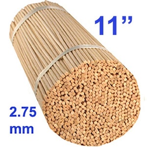 May include: A bundle of 11 inch long, natural wood diffuser sticks, 2.75 mm in diameter. The sticks are bundled together with a white elastic band.