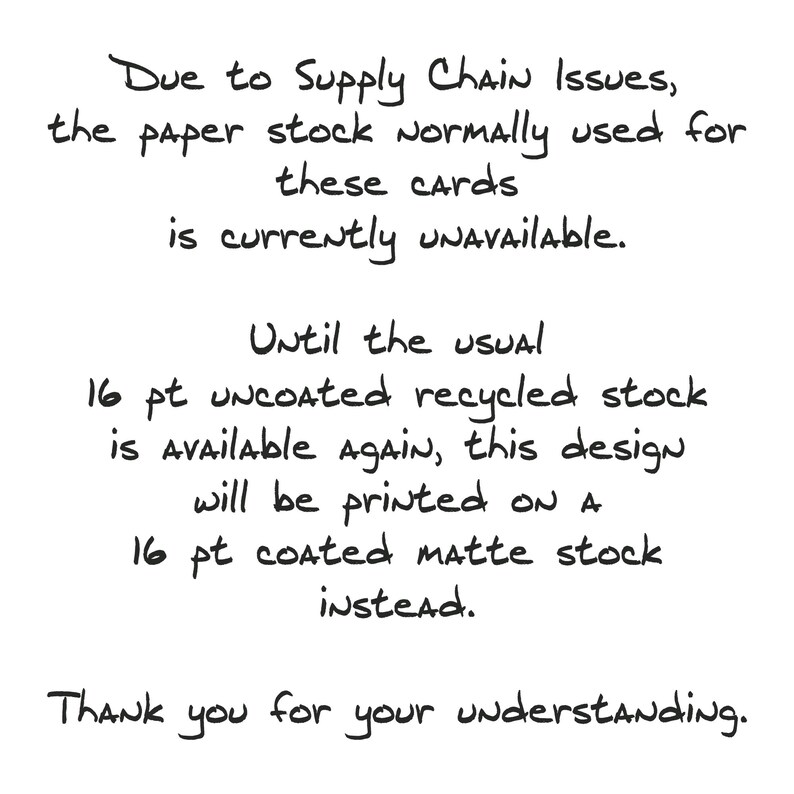May include: Text on a white background explains that due to supply chain issues, the usual paper stock for cards is unavailable. The design will be printed on a coated matte stock instead. The text ends with "Thank you for your understanding."