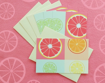 Colorful Citrus Summer Quartet Postcards (set of 4 cards + envelopes), featuring grapefruit, orange, lemon, & lime