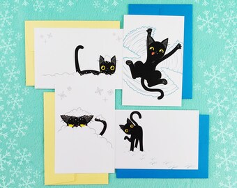 Funny Black Cat in the Snow Christmas & Winter Holiday Postcards (set of 4 cards)