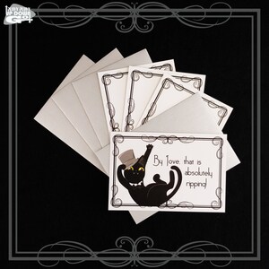 May include: A set of five blank greeting cards with black and white decorative borders. The cards feature a black cat wearing a top hat and bow tie with the text "By Jove, that is absolutely ripping!"
