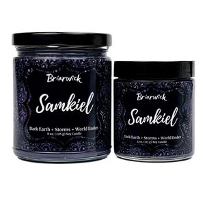 May include: Two glass jars of soy candles with black lids. The labels read "Briarwick Samkiel Dark Earth + Storms + World Ender." The larger jar contains 8 oz. (226 g) of candle, and the smaller jar contains 4 oz. (113 g). The jars have a dark purple wax.
