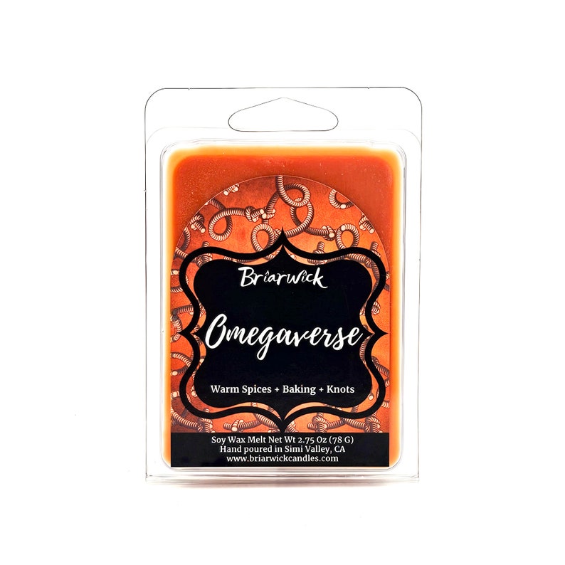 a packaged package of orange colored candles