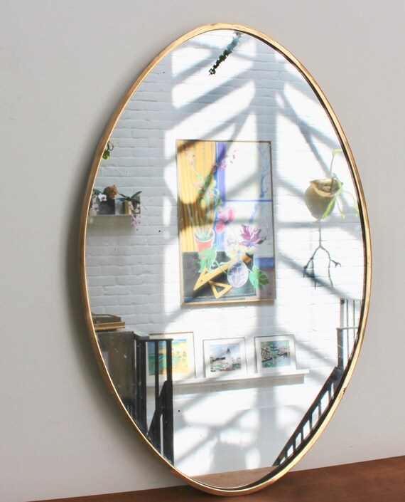 Mid Century Oval Italian Wall Mirror With Brass Frame Circa Mid Century Oval Italian Wall Mirror
