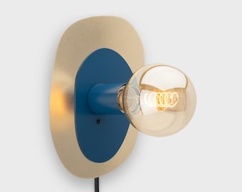 Thea Plug-in Wall Sconce Navy Blue On/Off Switch Mid Century Modern Bedside Lamp Raw Brass