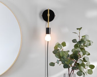 Olle Wall Sconce Black Plug-in On/Off Switch Mid Century Raw Brass