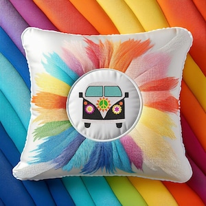 May include: White pillow with a rainbow design and a white circle with a black and white vintage van with a peace sign and flowers embroidered in the center.