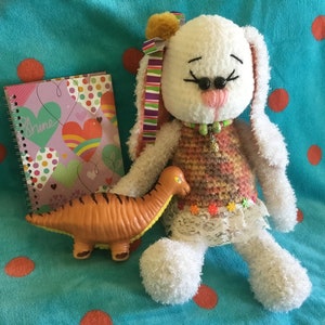 Handmade crochet Soft Bunny Girl with her squishy toy Dinosaur toy doll
