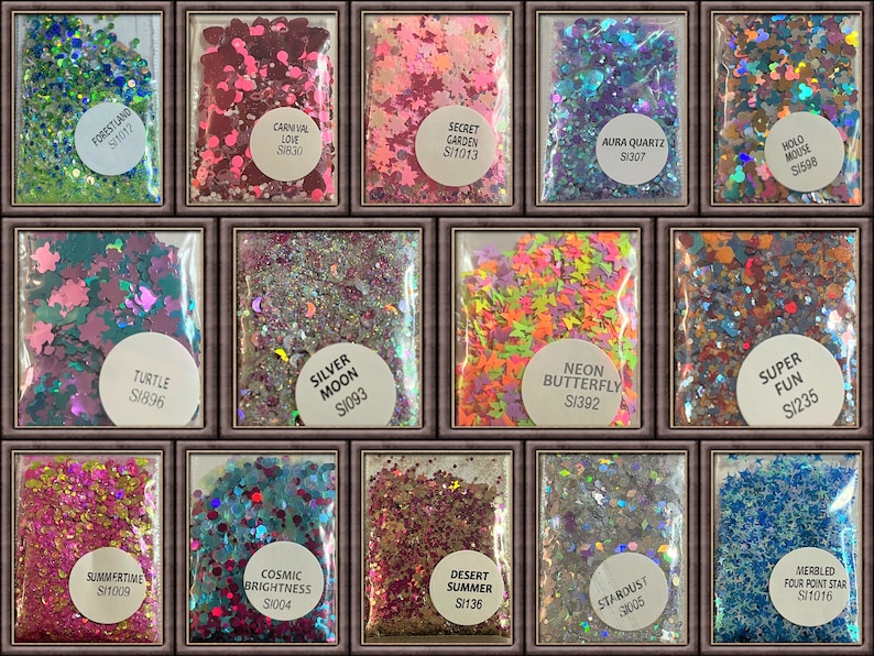 May include: A collection of glitter packets in various colors and shapes. The packets are labeled with names like "Forestland," "Carnival Love," and "Neon Butterfly." The glitter includes stars, butterflies, and other shapes, in colors like green, pink, and blue.