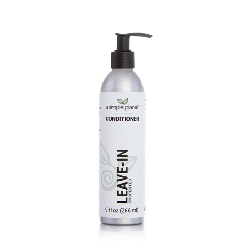 a bottle of leave - in conditioner on a white background