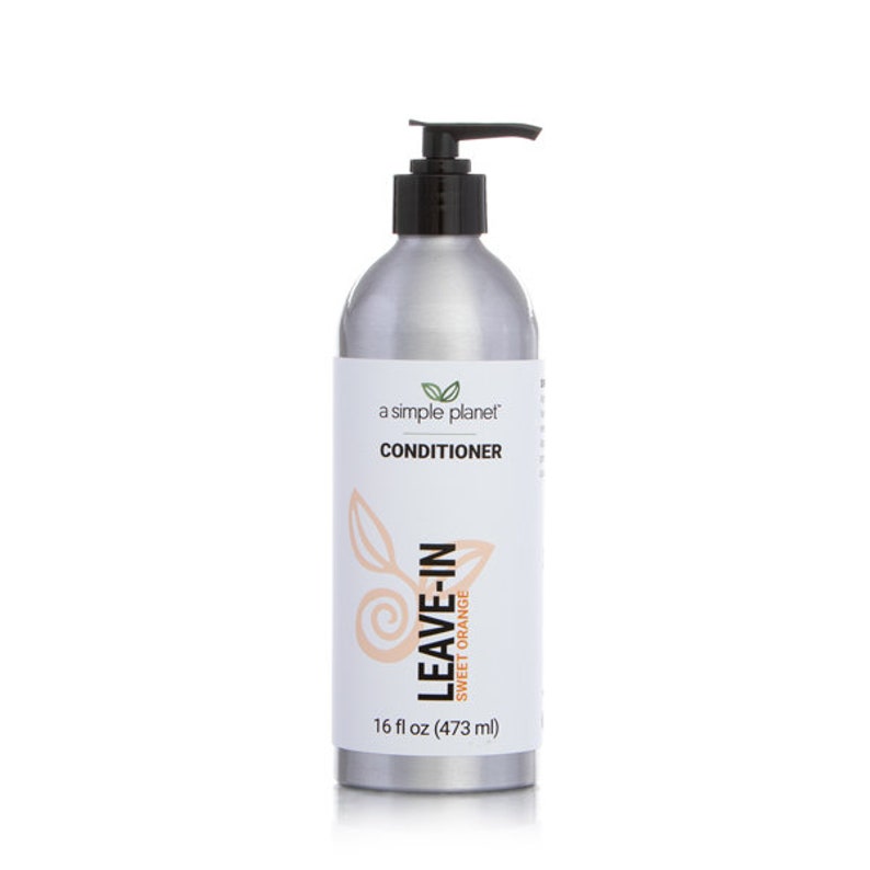 a bottle of leave - in conditioner on a white background