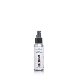 May include: A silver spray bottle with a black cap and a white label that says "a simple planet" and "CURL REVITALIZER" with the words "REFRESH" and "SWEET ORANGE" in a larger font. The bottle is 2.7 fl oz (80 ml).