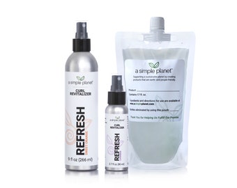 May include: Three silver spray bottles with a simple planet logo and the text "Curl Revitalizer" and "Refresh". The bottles are labeled with different scents: Sweet Orange, Lavender, and Unscented. The bottles are 9 fl oz, 2.7 fl oz, and 17 fl oz.