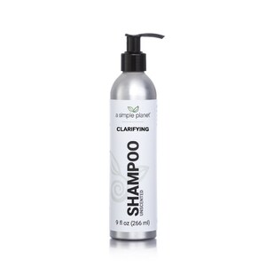 May include: A silver bottle of clarifying shampoo with a black pump top. The bottle is labeled "a simple planet" and "Clarifying Shampoo Unscented". The bottle contains 9 fl oz (266 ml) of shampoo.