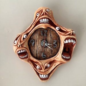 Large wall hanging gaping gob clock