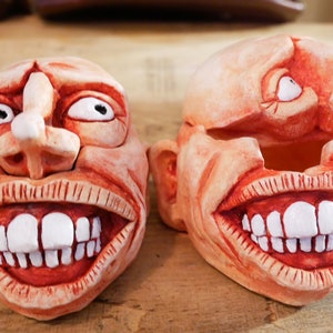 Grinning Head container,ashtray or genral stuff holder.