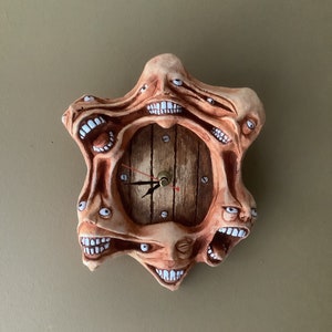 6 headed wall hanging clock