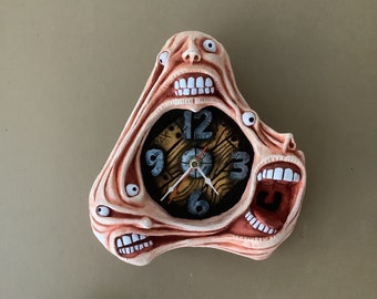 3 Headed triangle wall clock