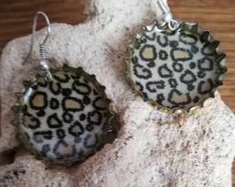 Earrings made of crown caps with motif