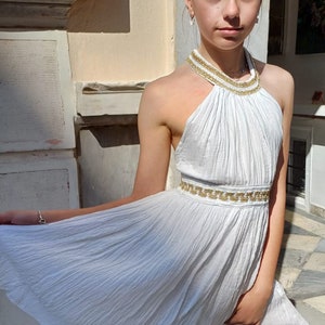 2001 Nymph Greek Ancient Dress  Above the knee. Nymphs were depicted as beautiful young women with attributes matching their abode.