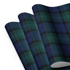 Wrapping paper sheets in black watch pattern.