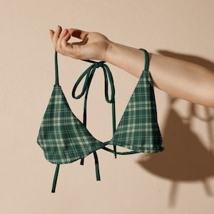 May include: A green and white checked bikini top with adjustable straps.