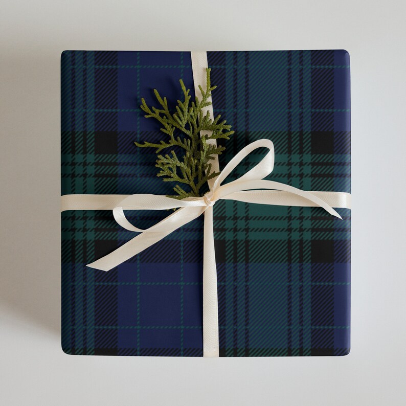 Wrapping paper sheets in black watch pattern.