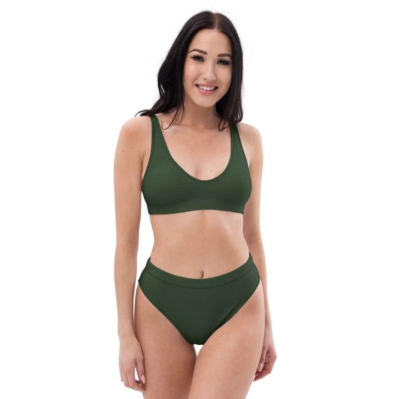 Recycled high-waisted bikini in myrtle green color with green lining.