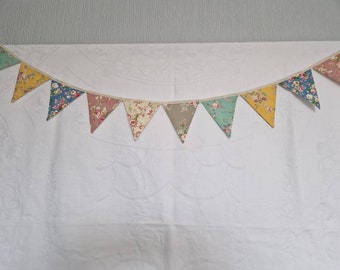Handmade chintzy bunting 18 x  4.5" flags in beautiful cotton fabric from Rose and Hubble. Handmade with care