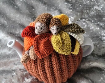 Hedgehog and autumn leaves tea cosy