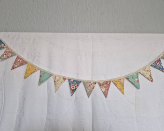 Handmade chintzy bunting 24x  3" flags in beautiful cotton fabric from Rose and Hubble.