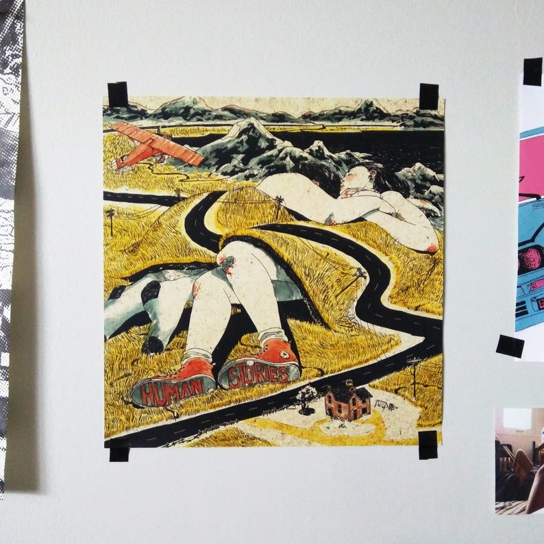 May include: A vintage-style illustration of a person lying on a winding road in a field. The person is wearing red shoes with the words "Human Stories" written on them. The illustration is in a yellow, green, and brown colour palette.