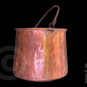 May include: A copper pot with a handle, showing signs of age and use. The pot has a rounded bottom and a slightly flared top. The handle is attached to the pot with two rivets.
