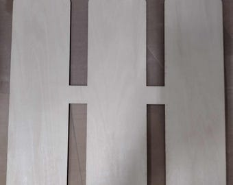 May include: Three wooden rectangular panels with cutouts in the middle, creating a repeating pattern.