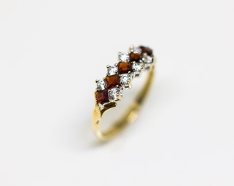 RECONDITIONED: 9ct gold ladies ring with red and white stones. Size L. Free shipping.